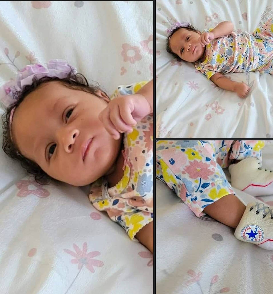 Ka'Lea joined the competition — help win amazing prizes! baby, baby_sleeping, baby_toddler_clothing, child, comfort, eyelash, facial_expression, happy, head, human, linens, pattern, person, photograph, pink, shorts, skin, sleeve, smile, t_shirt