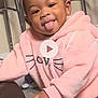 Saeyah is registered to the contest to win money with this photo: toddler, child, pink_outfit, headband, tongue_out, indoor, carpet, pacifier, furniture, couch, happy, cute, playful, baby, person, smiling, cozy, footwear, hands, expression
