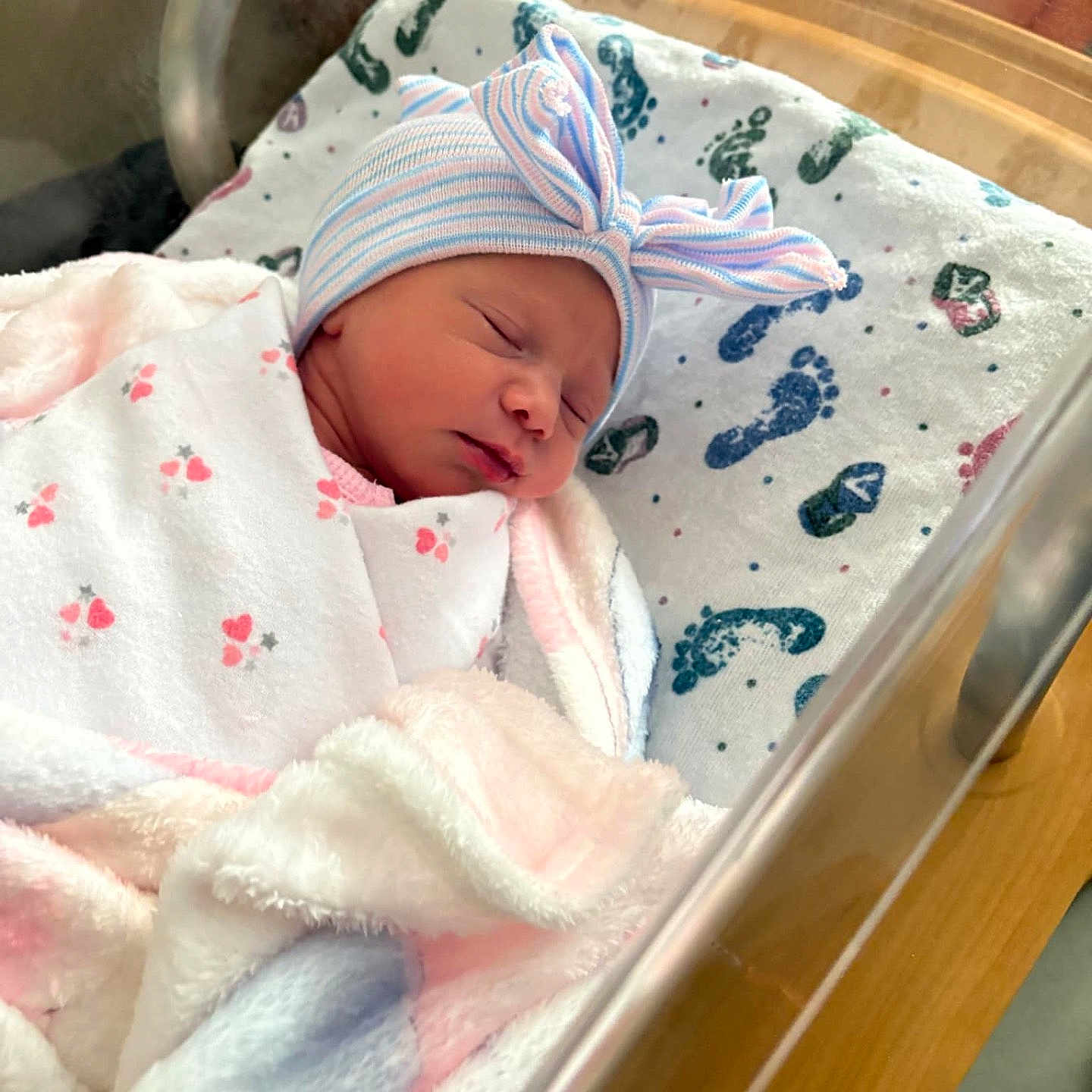 Athena joined the competition — help win amazing prizes! architecture, baby, bed, blanket, building, crib, furniture, hospital, infantbed, newborn, person, sleeping