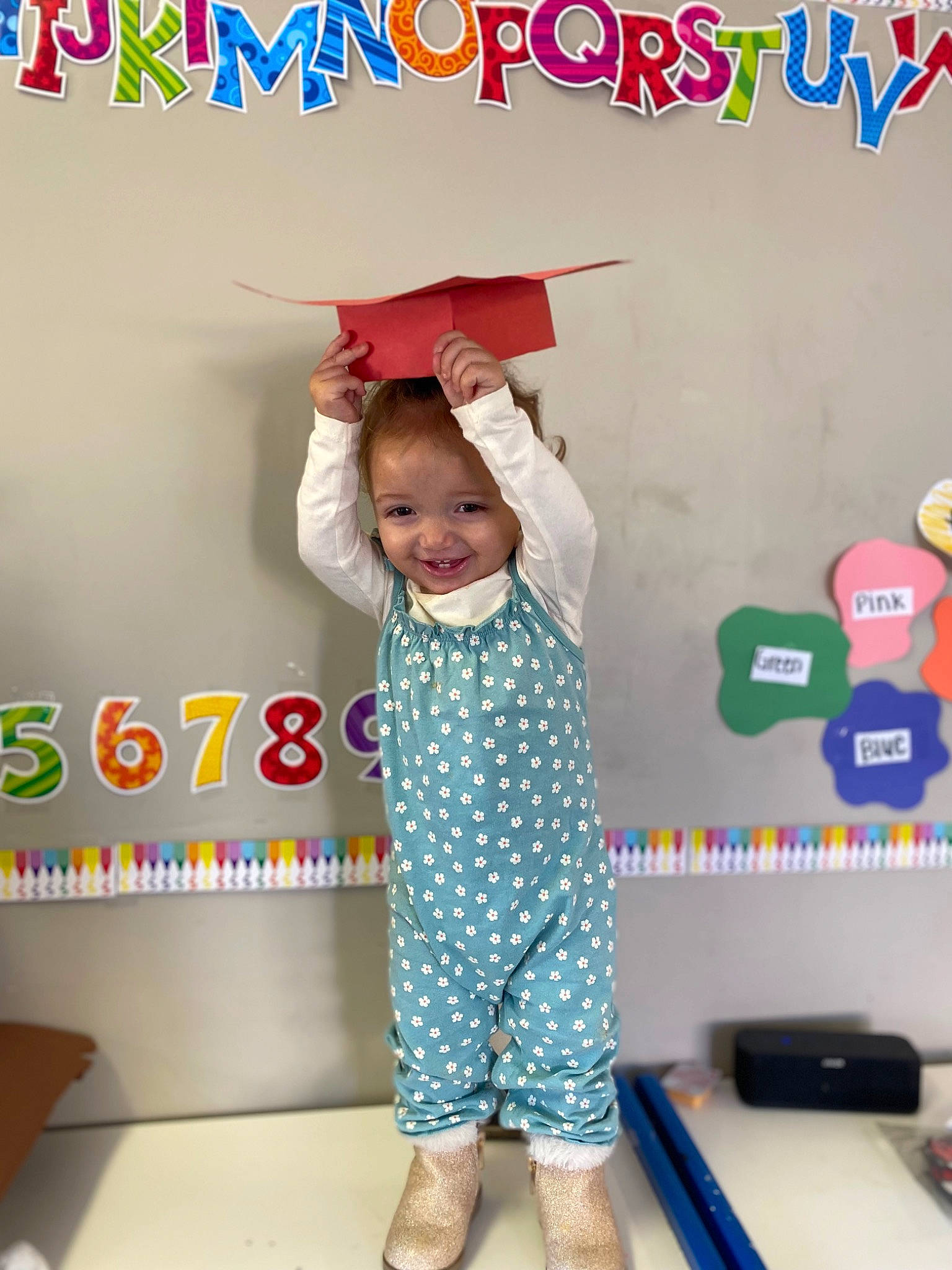 Cali joined the competition — help win amazing prizes! baby_toddler_clothing, bag, child, design, facial_expression, font, fun, handwriting, happy, joy, magenta, pattern, person, pink, play, product, room, sleeve, smile, t_shirt