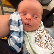 Amari joined the competition — help win amazing prizes! baby, bib, blanket, clothing, cushion, face, head, homedecor, newborn, person, photography, portrait, scarf, sleeping, towel