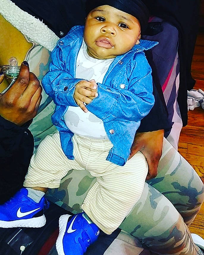 Janai joined the competition — help win amazing prizes! arm, black_hair, blue, cheek, child, cool, headwear, leg, outerwear, person, photography, sitting, smile