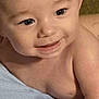 Bruce joined the competition — help win amazing prizes! baby, smiling, close_up, face, blue_towel, skin, child, cute, mouth, eyes, infant, happy, portrait, young, human, baby_skin, expression, cute_face, small_tooth, baby_arm