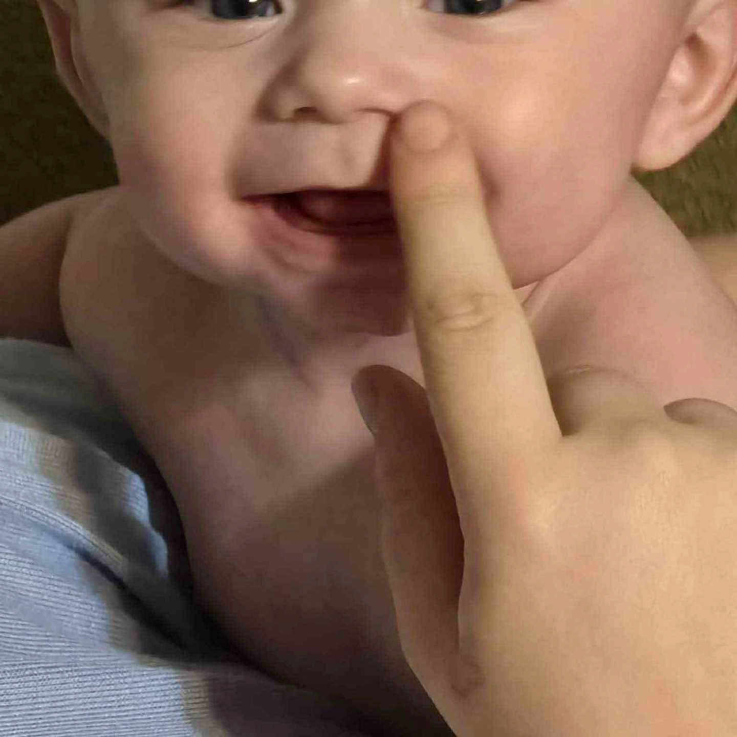 Bruce joined the competition — help win amazing prizes! baby, baby_face, child, closeup, cute, expression, face, finger, hand, happy, indoors, infant, person, playful, portrait, skin, skin_tone, smile, touching, young