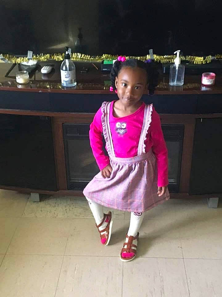 Skyla joined the competition — help win amazing prizes! baby_toddler_clothing, chair, child, costume, event, fashion_accessory, fashion_design, flooring, fun, happy, jewellery, leisure, magenta, person, room, sandal, sitting, smile, sock, toddler