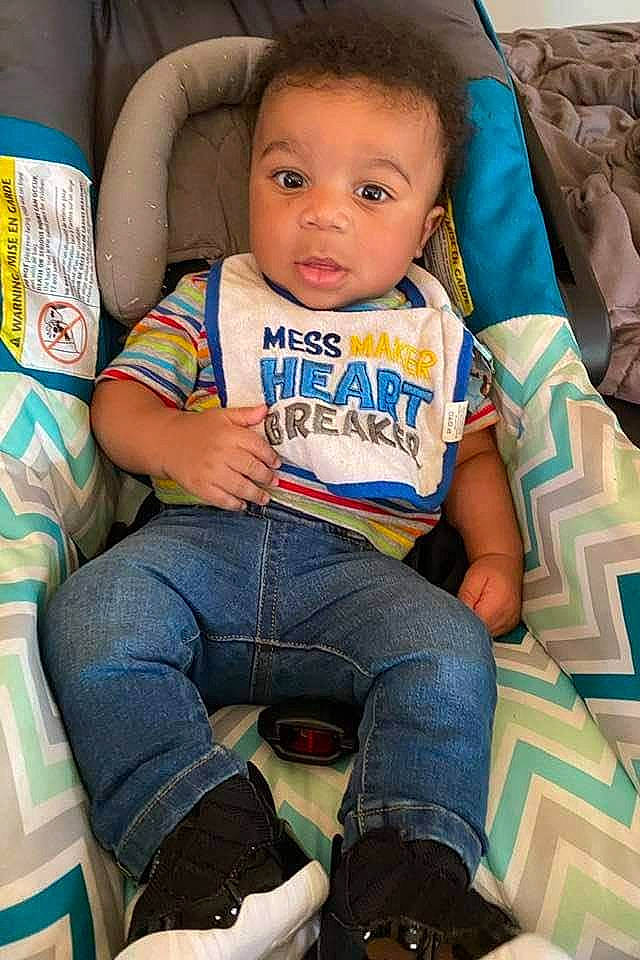 Aiden is registered to the contest to win money with this photo: baby, baby_toddler_clothing, chair, cheek, child, clothing, comfort, eye, happy, head, iris, jeans, lap, leg, people, person, skin, sleeve, thigh, toddler