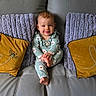 Maisie joined the competition — help win amazing prizes! baby, bee, child, couch, cozy, cute, daisy, decor, flower_pattern, gray_leather, happy, home_interior, indoor, infant, love, onesie, pillow, portrait, sitting, smile