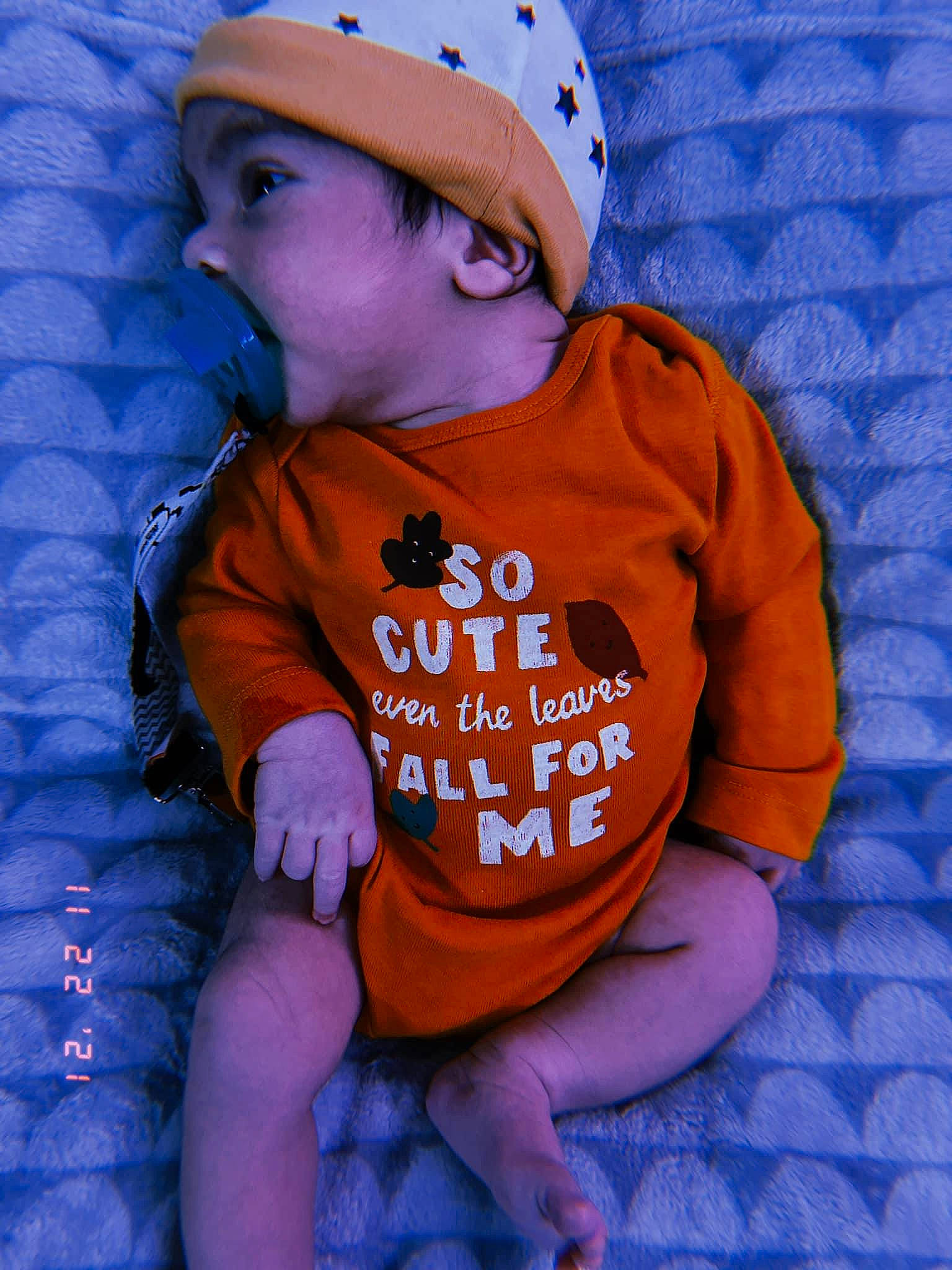 Jordan joined the competition — help win amazing prizes! baby, baby_toddler_clothing, baseball_cap, beanie, blue, cap, child, electric_blue, happy, headgear, headwear, hood, magenta, orange, pattern, person, pink, purple, sitting, sleeve