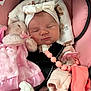 baby, blanket, car_seat, child, clothing, cute, headband, indoors, infant, newborn, pacifier, peaceful, pink, plush_toy, resting, safety_harness, sleeping, soft_toy, toddler, white