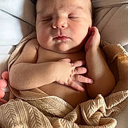 Marley is registered to the contest to win money with this photo: baby, newborn, sleeping, blanket, soft, hand, face, peaceful, cozy, bed, infant, skin, cute, resting, wrapped, fingers, portrait, indoors, calm, child
