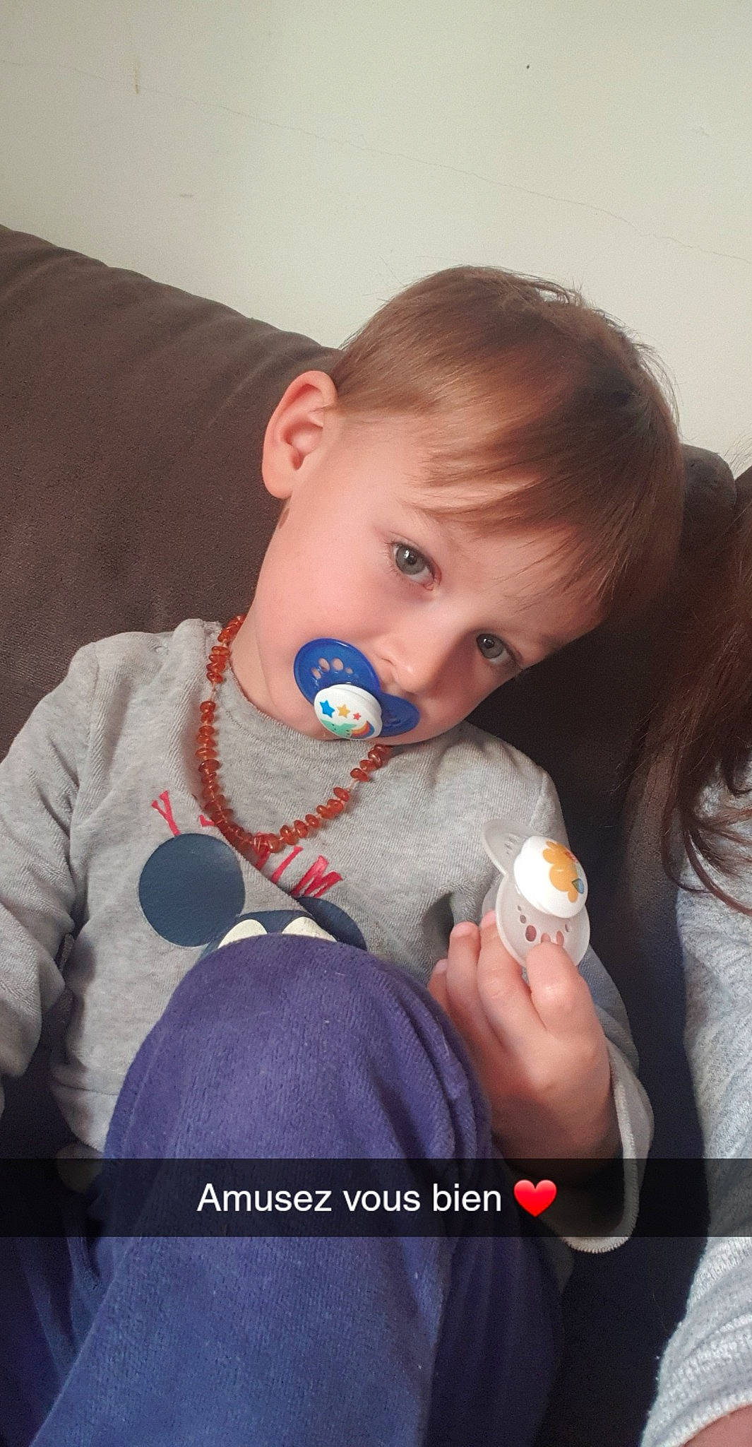 Jean-baptiste participe au concours pour gagner de l'argent avec cette photo : baby, baby_toddler_clothing, cheek, drinkware, ear, eyebrow, eyelash, face, finger, gesture, hand, happy, head, iris, lip, mouth, neck, nose, person, skin