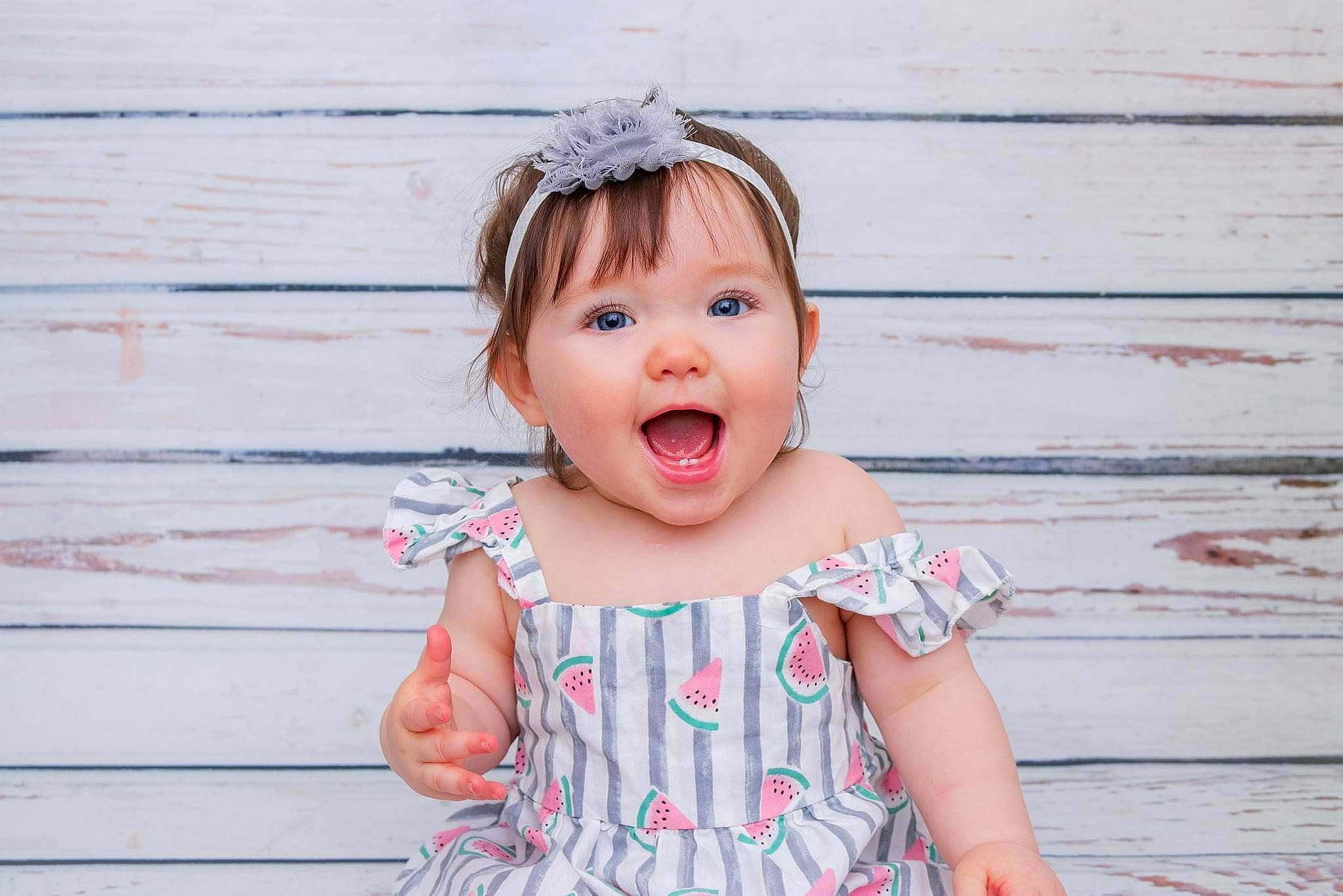 Addy is registered to the contest to win money with this photo: azure, baby_toddler_clothing, child, day_dress, dress, eye, eyelash, face, flash_photography, fun, happy, iris, jewellery, neck, person, pink, skin, sleeve, smile, standing