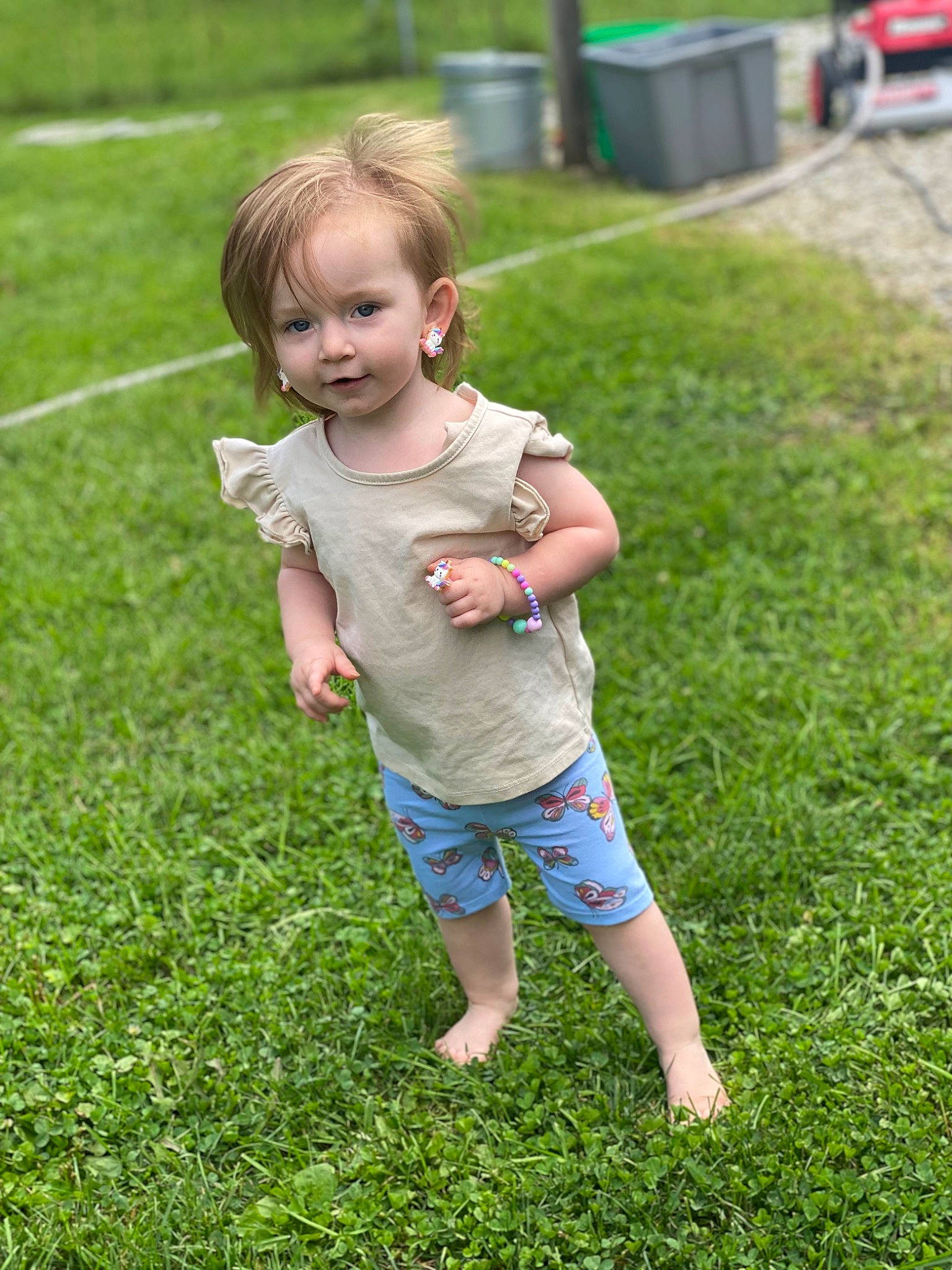 Maci joined the competition — help win amazing prizes! baby, baby_toddler_clothing, barefoot, child, foot, fun, grass, grass_family, grassland, groundcover, happy, lawn, leisure, meadow, people_in_nature, person, plant, recreation, smile, t_shirt