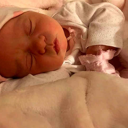 Celina is registered to the contest to win money with this photo: baby, baby_sleeping, bedtime, birth, cheek, child, childbirth, close_up, comfort, eye, finger, hand, head, lip, mouth, nap, nose, skin, sleep, toddler