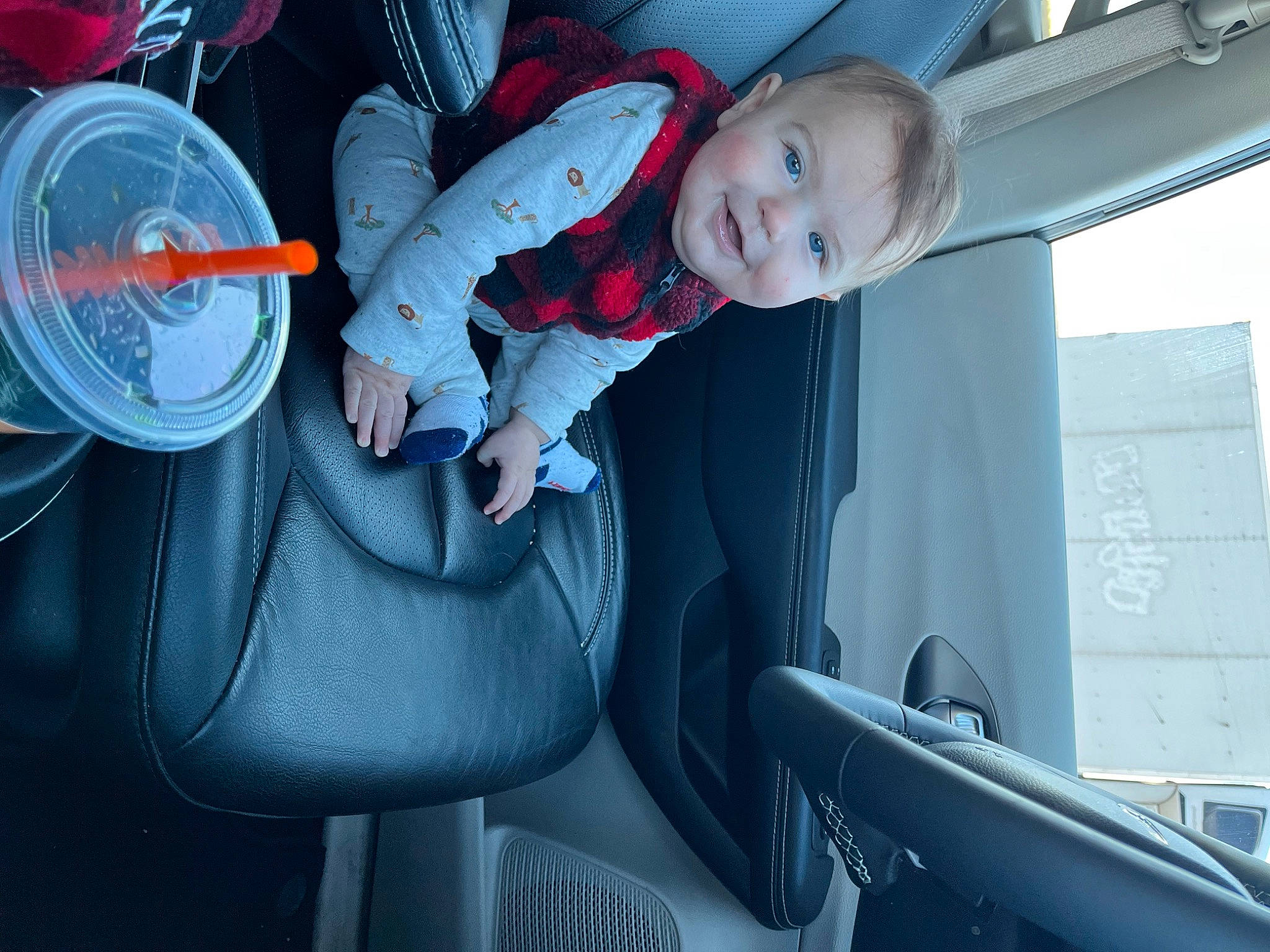 Xander is registered to the contest to win money with this photo: auto_part, automotive_design, automotive_exterior, automotive_tire, baby, car_seat, car_seat_cover, comfort, electric_blue, family_car, joy, mode_of_transport, motor_vehicle, person, smile, snapshot, steering_wheel, toddler, vehicle, vehicle_door