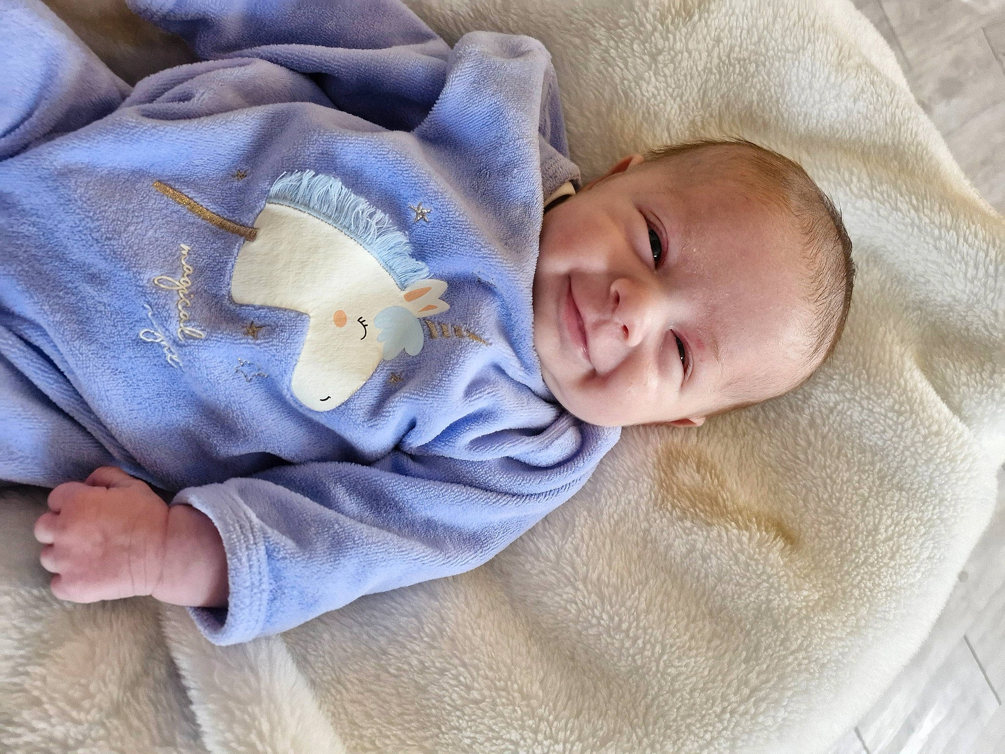 Celeste a rejoint le concours — aidez-le/la à gagner de superbes lots ! baby, baby_products, baby_safety, baby_sleeping, baby_toddler_clothing, cheek, child, collar, comfort, eye, head, headgear, iris, joy, linens, person, skin, sleep, sleeve, smile