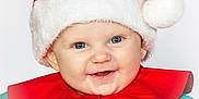 Clara is registered to the contest to win money with this photo: baby, child, santa_hat, red_bow, smiling, blue_eyes, holiday, christmas, festive, cute, face, portrait, infant, costume, red, green, happy, closeup, celebration, seasonal