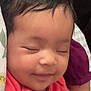 Brynn is registered to the contest to win money with this photo: baby, infant, sleeping, smile, face, child, clothing, blanket, comfort, closeup, cute, soft, rest, peaceful, young, portrait, human, skin, hair, indoors
