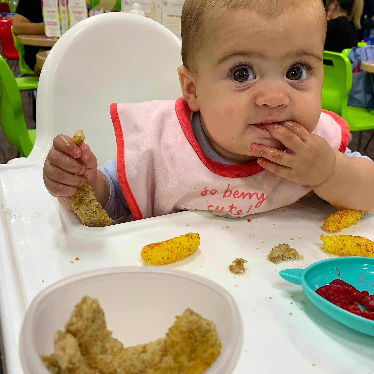Macy is registered to the contest to win money with this photo: adult, baby, bodypart, bread, cutlery, eating, face, female, finger, food, head, lunch, male, man, meal, person, photography, portrait, spoon, woman