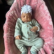 Elaysha joined the competition — help win amazing prizes! baby, blanket, child, comfort, cozy, cute, fabric, footwear, headband, indoor, infant, pajamas, peaceful, pink, portrait, relaxation, resting, sleeping, small_hands, soft