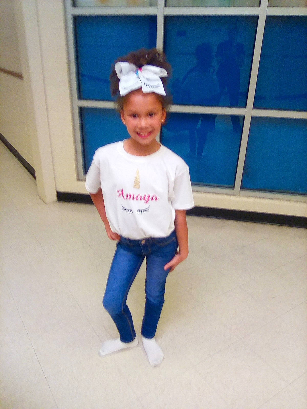 Amaya joined the competition — help win amazing prizes! blue, child, dance, ear, face, fashion_accessory, footwear, hair_accessory, happy, head, headgear, headwear, joy, person, shoe, sleeve, smile, sportswear, standing, t_shirt