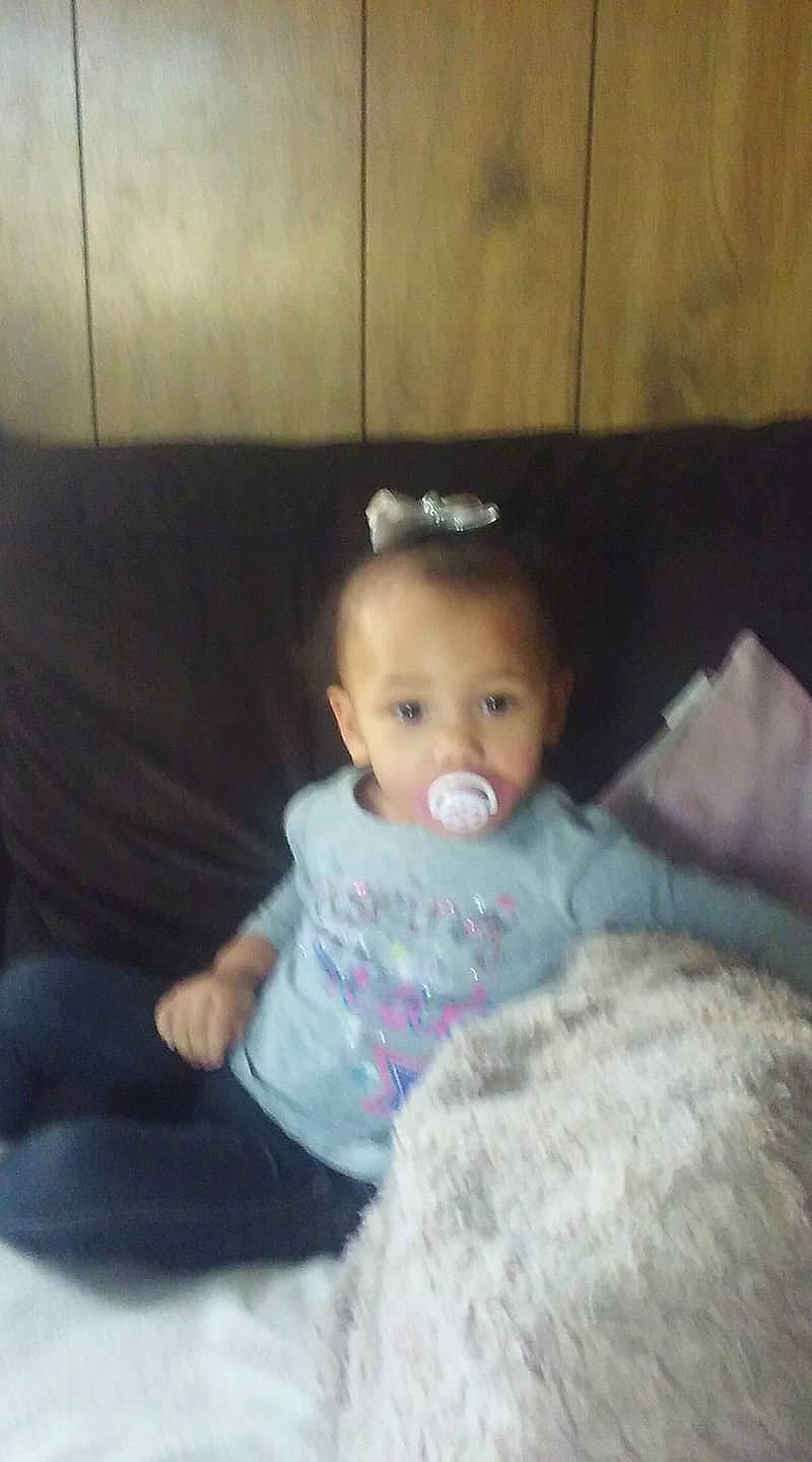 Abrielle is registered to the contest to win money with this photo: baby, cheek, child, ear, eye, face, head, iris, joy, lip, mouth, nose, person, sitting, skin, toddler