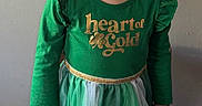 Ophelia joined the competition — help win amazing prizes! child, girl, green_dress, bow, boots, standing, chair, smiling, indoor, portrait, happy, clothing, fashion, footwear, long_sleeves, tights, wall, floor, person, cute