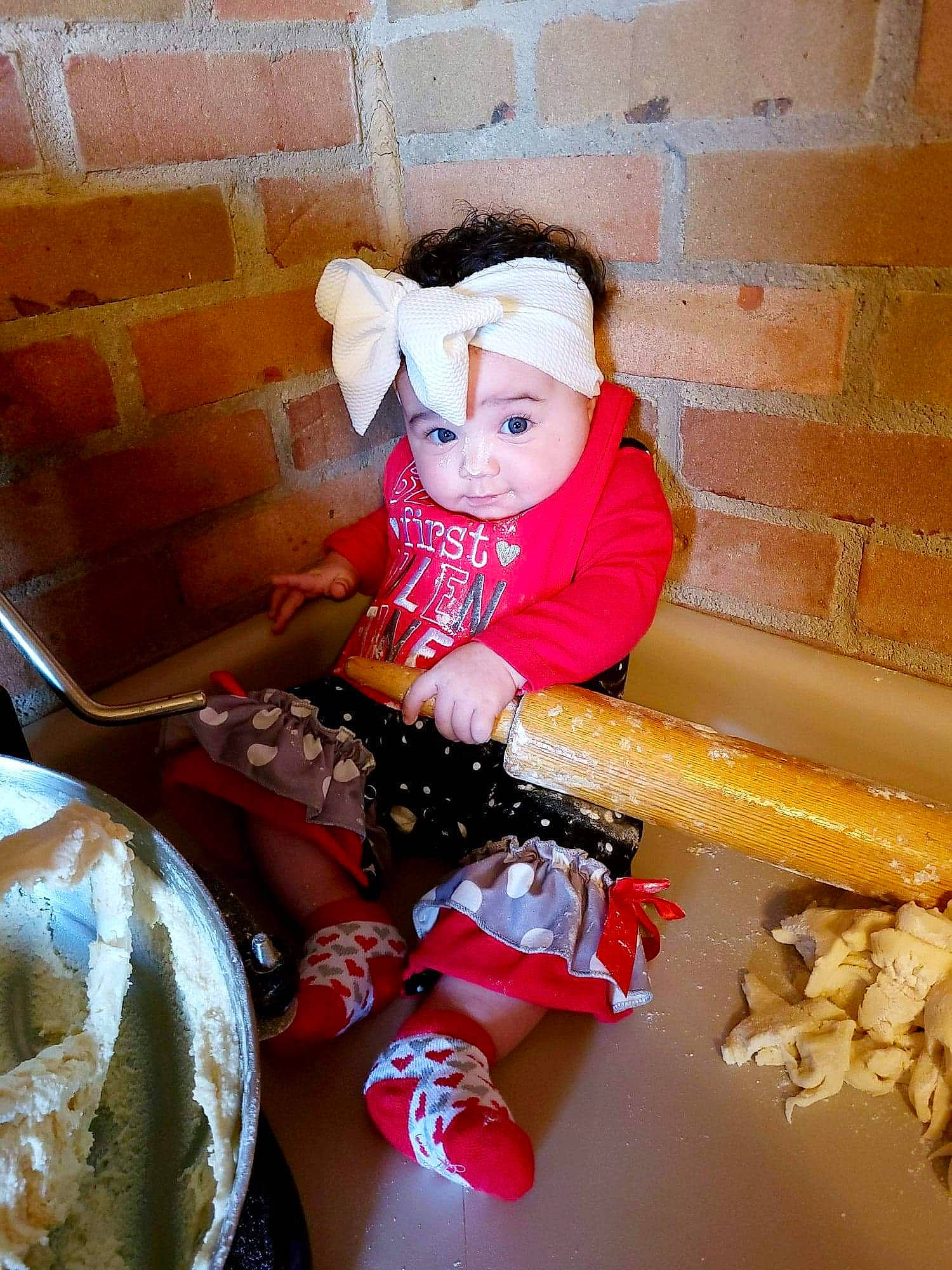 Amariah joined the competition — help win amazing prizes! brick, brickwork, carmine, doll, event, headwear, holiday, person, room, sitting, stuffed_toy, toy, wig, wood