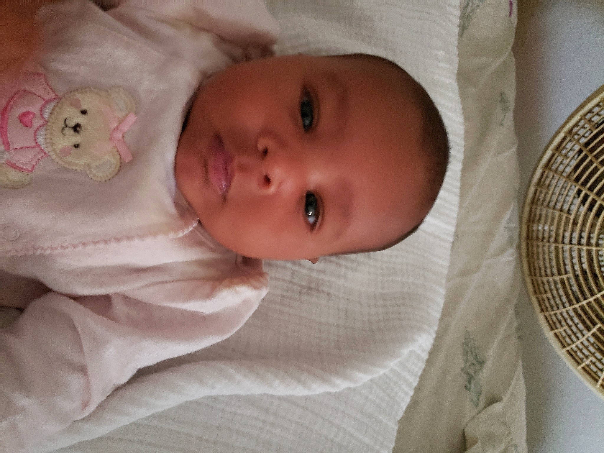 Louella is registered to the contest to win money with this photo: baby, baby_products, baby_safety, bedtime, cheek, child, chin, eye, face, head, infant_bed, iris, lip, mouth, nose, person, pink, product, skin, textile