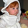 Autumn is registered to the contest to win money with this photo: toddler, child, baby, hooded_robe, white_robe, bear_ears, red_hair, blue_eyes, soft_texture, cozy, indoor, portrait, cute, looking_away, plush, warm_clothing, bed, toy, blurred_background, closeup