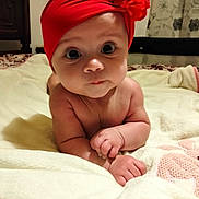 Valentina participe au concours pour gagner de l'argent avec cette photo : baby, bed, big_eyes, blanket, chubby_cheeks, closeup, curtain, cute, flower_headband, gaze, hands, headband, indoor, infant, nursery, portrait, red_headband, skin, soft_lighting, tummy_time