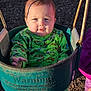 Faye joined the competition — help win amazing prizes! baby, infant, child, swing, playground, park, onesie, green_clothing, ninja_turtles, sunlight, shadow, face, cheeks, eyes, wood_chips, picnic_table, metal_chain, seat, outdoor, boot