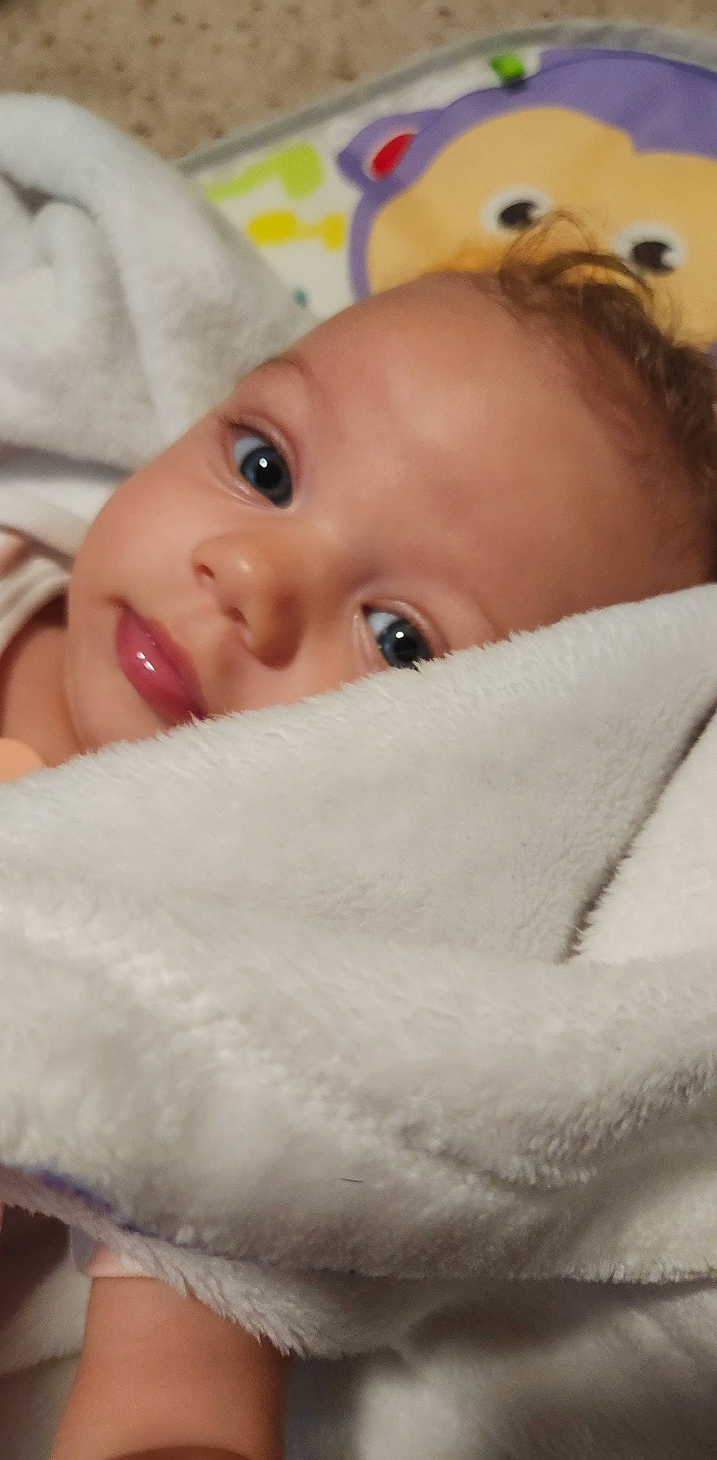 Kaisyn is registered to the contest to win money with this photo: baby, baby_toddler_clothing, cheek, child, close_up, comfort, eye, eyebrow, eyelash, happy, human_body, iris, linens, lip, mouth, nose, person, skin, smile, thumb