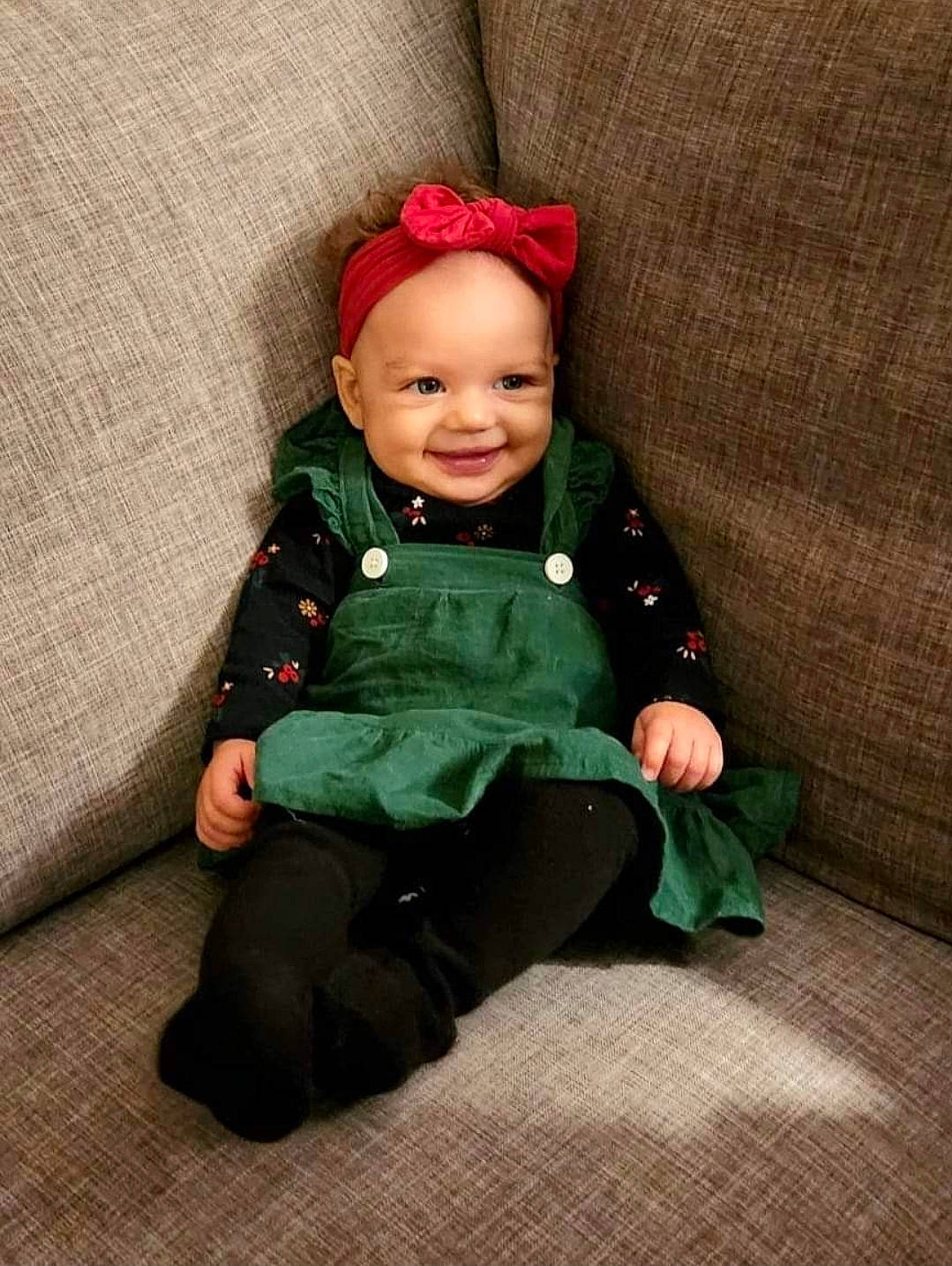 Kaisyn joined the competition — help win amazing prizes! baby, baby_toddler_clothing, carmine, collar, comfort, costume_hat, face, fictional_character, grass, happy, hat, head, headgear, holiday, joy, lap, outerwear, person, sitting, sleeve