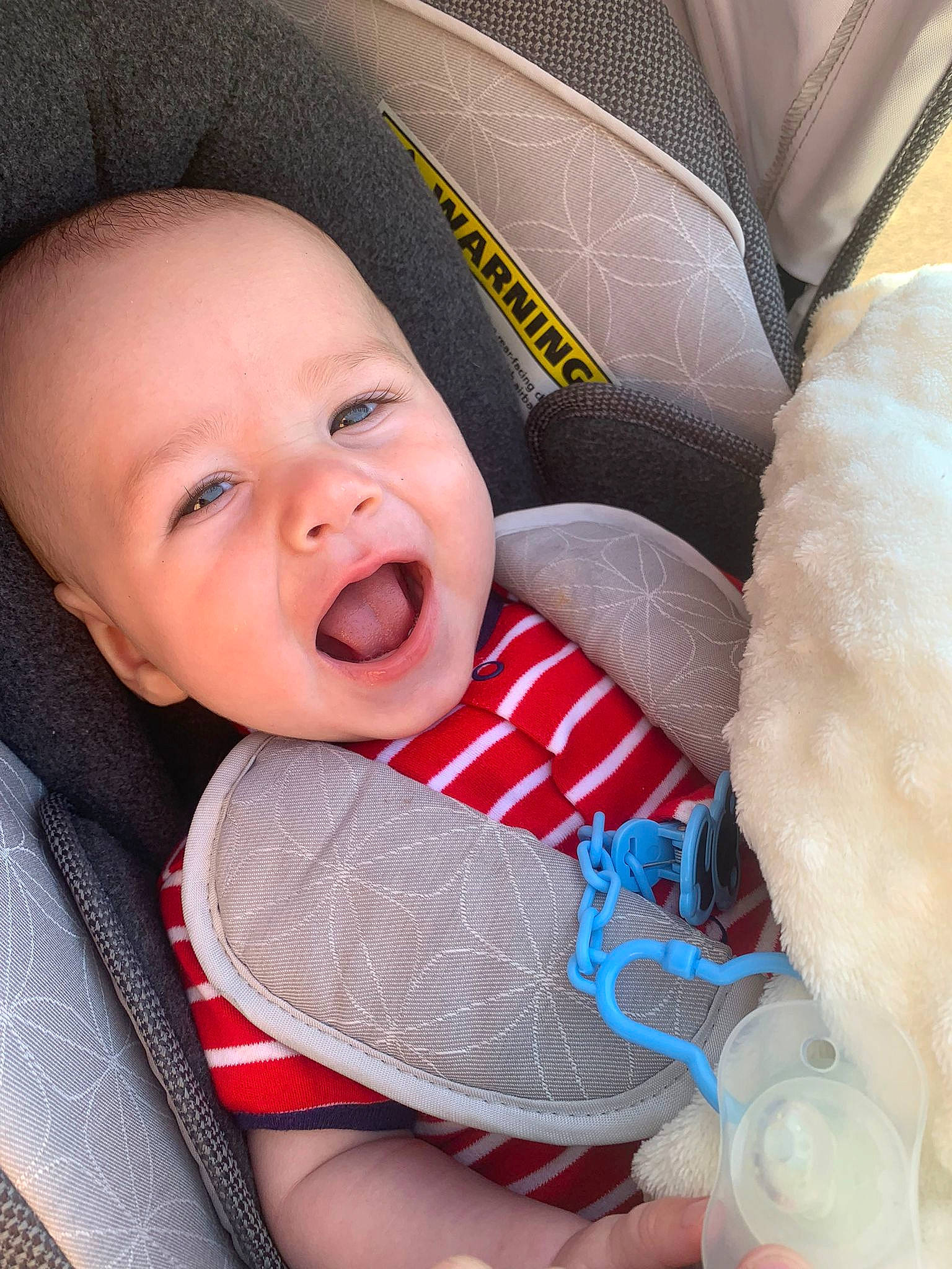 Theo is registered to the contest to win money with this photo: baby, baby_products, baby_sleeping, baby_toddler_clothing, car_seat, cheek, child, comfort, eye, face, facial_expression, finger, happy, lip, mouth, nose, person, skin, smile, textile