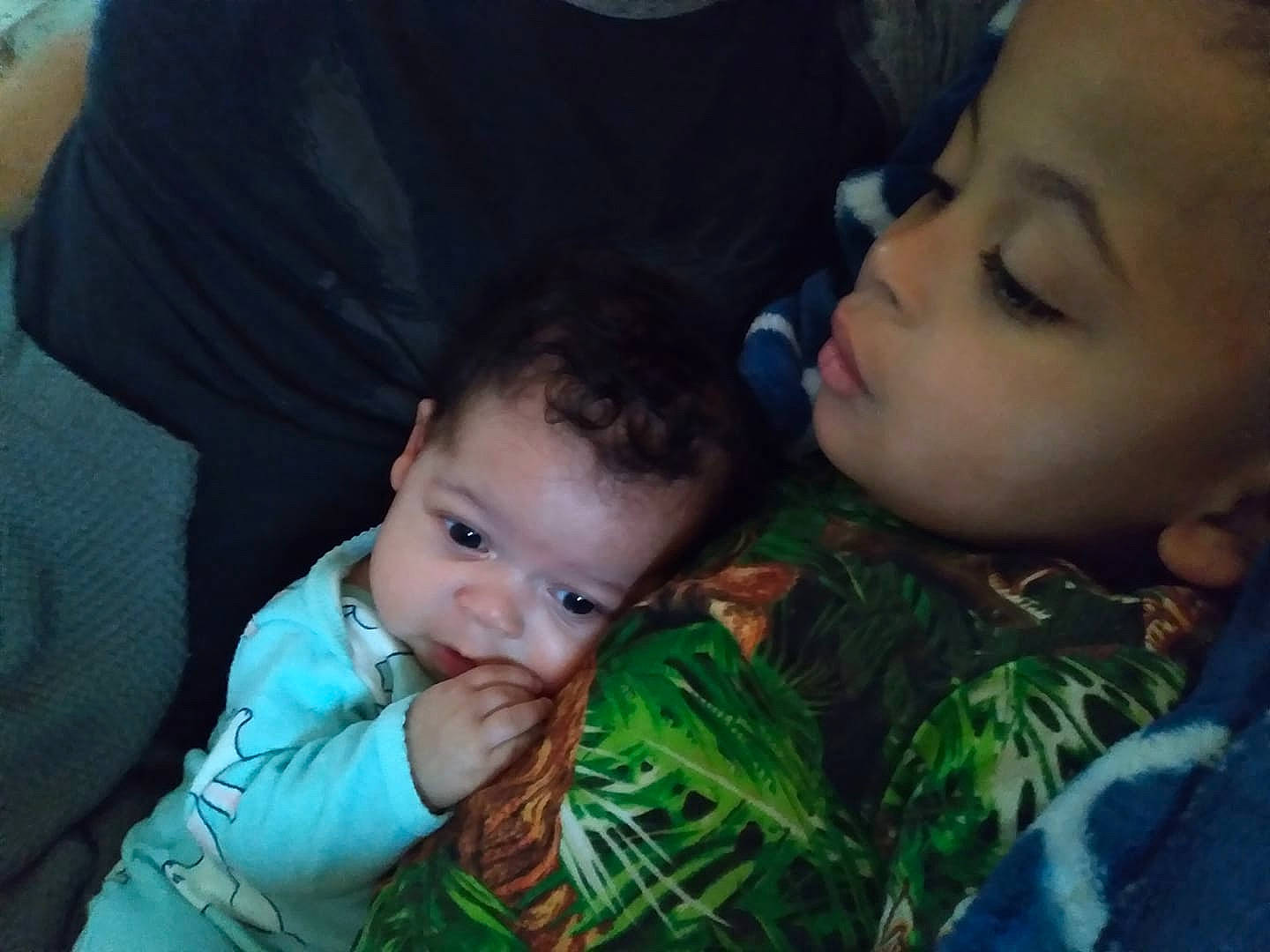 Braiden is registered to the contest to win money with this photo: baby, cheek, chin, cool, ear, eye, eyebrow, finger, forehead, grass, hairstyle, happy, iris, mouth, nose, organ, outerwear, person, plant, skin