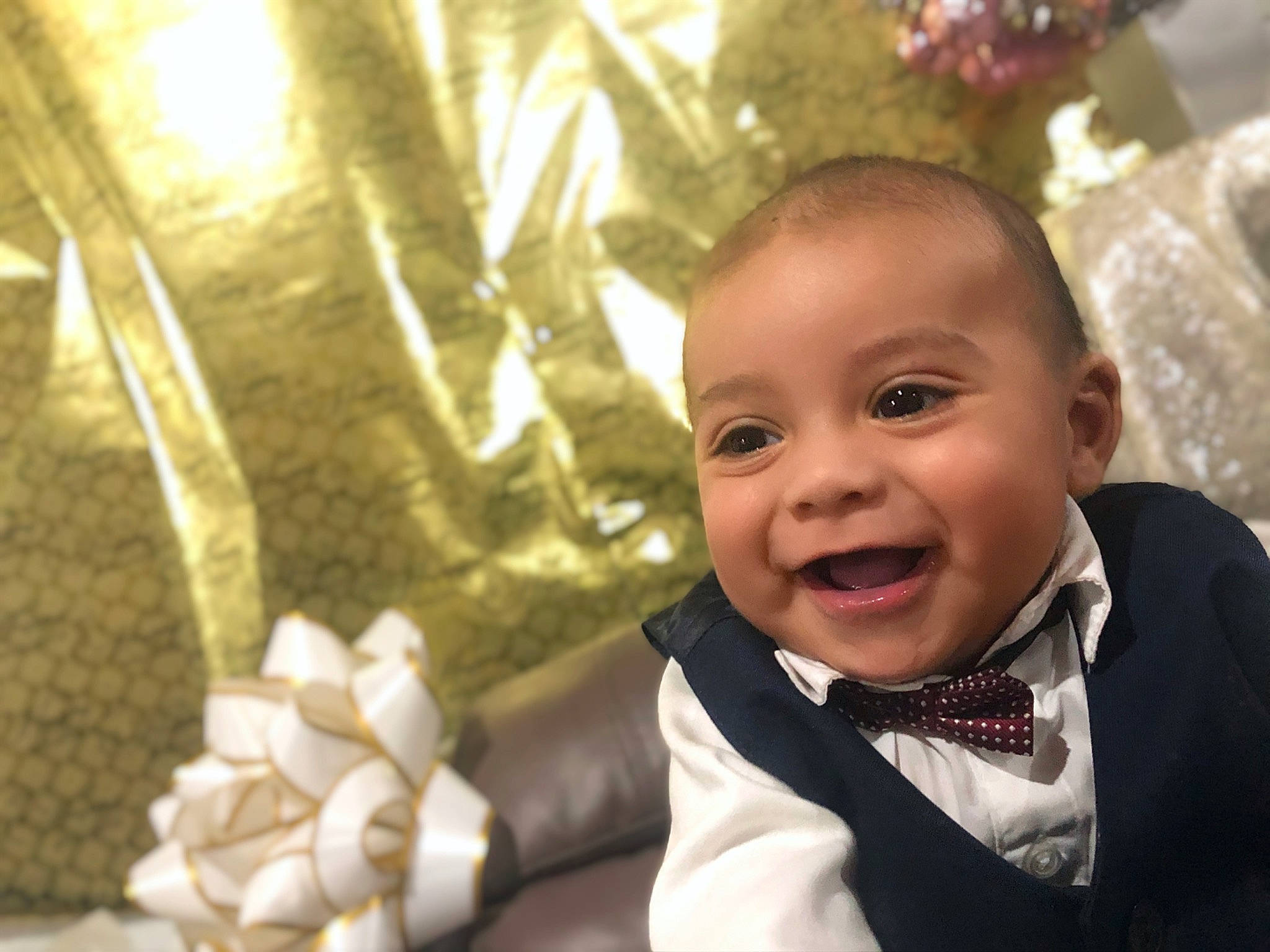 Diego joined the competition — help win amazing prizes! baby, cheek, child, face, facial_expression, formal_wear, happy, head, joy, laugh, outerwear, person, smile, toddler