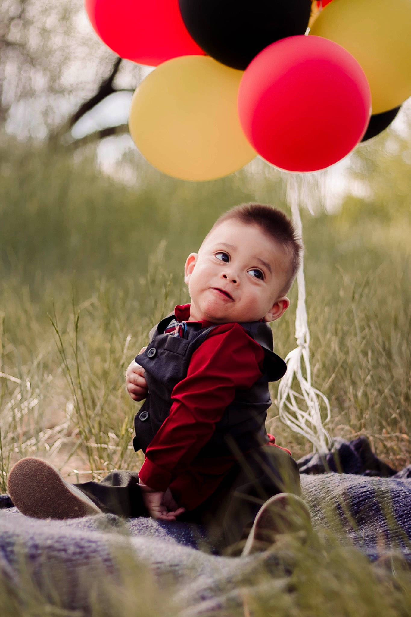 Diego is registered to the contest to win money with this photo: baby, balloon, child, fun, grass, happy, party_supply, person, photography, pink, play, red, smile, toddler, tree, yellow