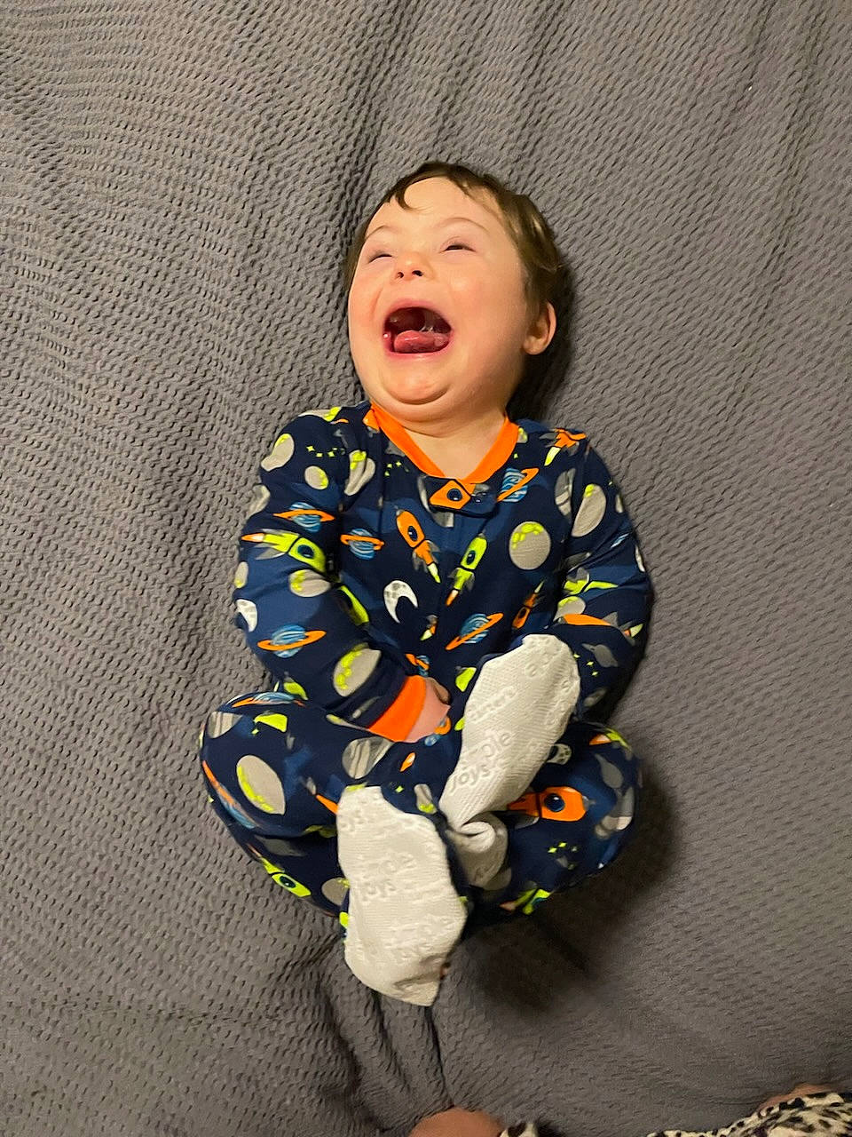 William joined the competition — help win amazing prizes! baby, baby_laughing, baby_toddler_clothing, child, collar, comfort, flash_photography, floor, flooring, happy, laugh, linens, long_sleeved_t_shirt, outerwear, pattern, person, sitting, sleeve, smile, t_shirt