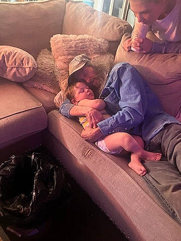 William joined the competition — help win amazing prizes! baby, child, cloud, comfort, couch, flooring, foot, fun, happy, head, human_leg, lap, leg, mouth, person, sitting, t_shirt, thigh, thumb, toddler