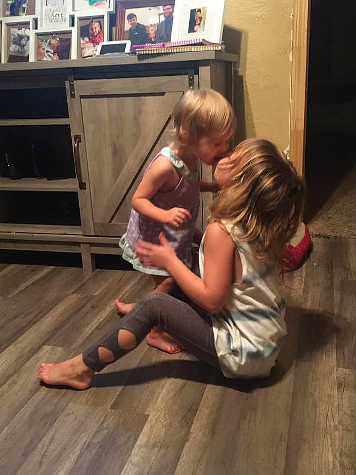 Dusty joined the competition — help win amazing prizes! blurred, child, floor, flooring, fun, leg, person, sitting