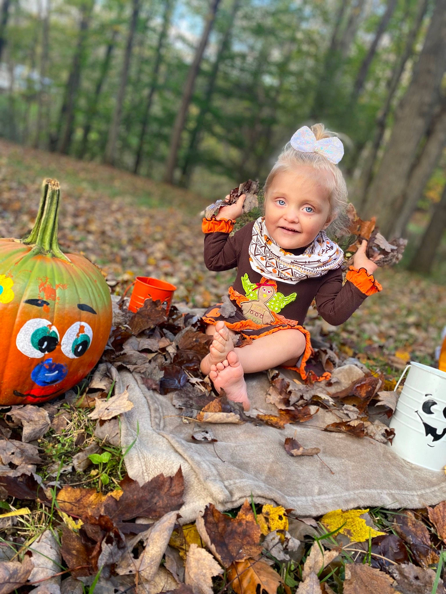 Daytona is registered to the contest to win money with this photo: adaptation, calabaza, child, cucurbita, gourd, grass, happy, leaf, mammal, nature, orange, people_in_nature, person, plant, pumpkin, squash, toddler, tree, vertebrate, winter_squash