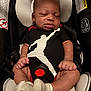 baby, infant, car_seat, onesie, sleeping, child, socks, safety, rest, cute, straps, padding, newborn, portrait, peaceful, clothing, babywear, head_support, indoor, seatbelt