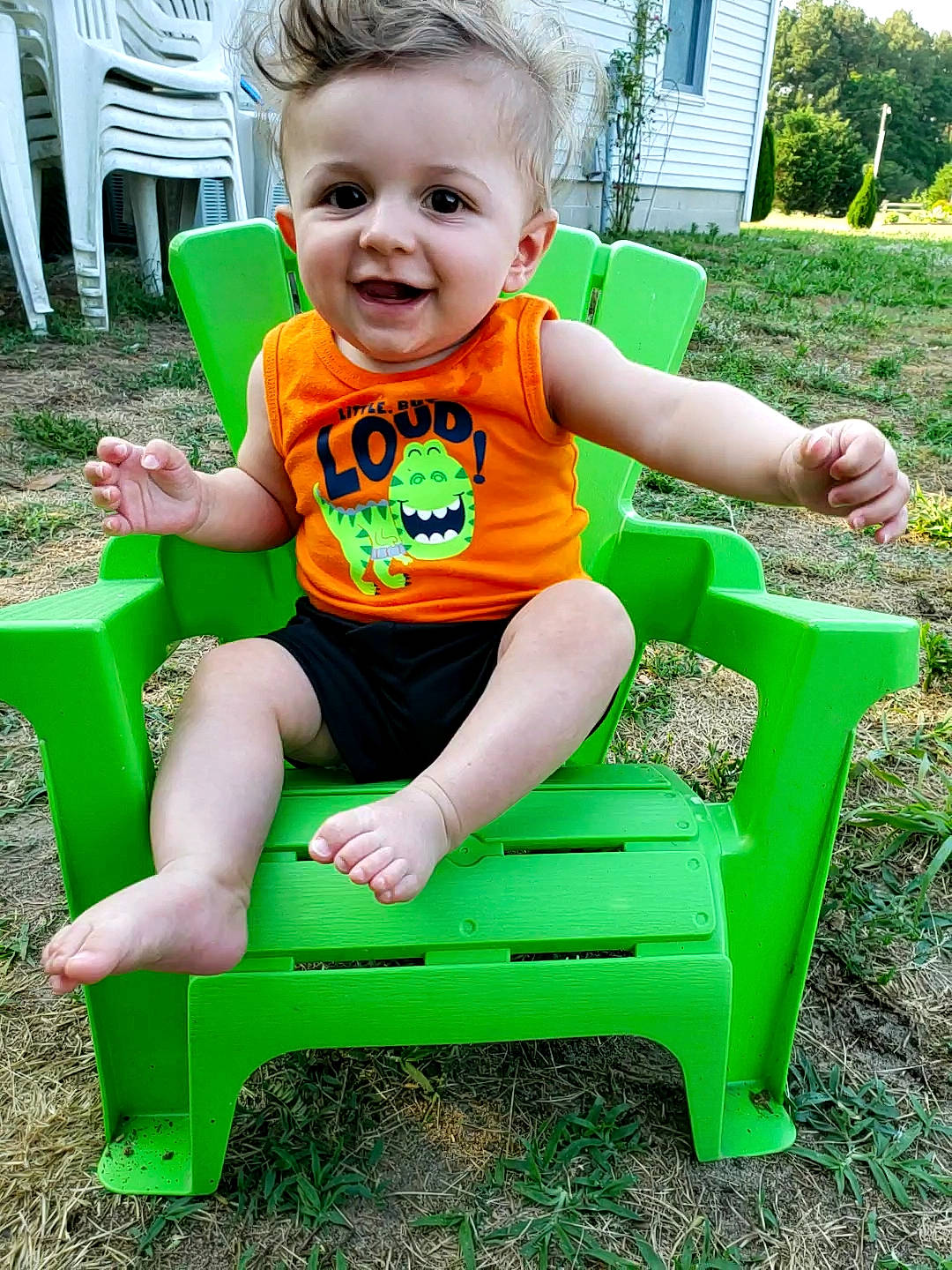 Kolson joined the competition — help win amazing prizes! chair, child, fun, furniture, garden, grass, green, joy, lawn, person, plant, play, sitting, smile, summer, toddler, vacation