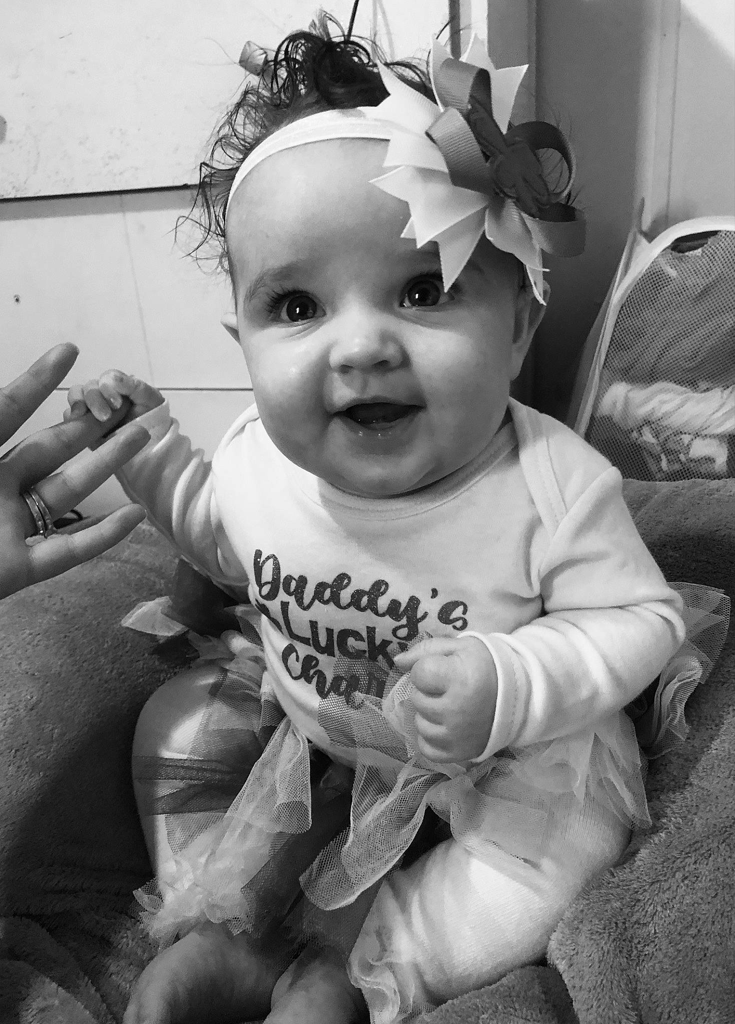 Ariah joined the competition — help win amazing prizes! arm, baby, baby_toddler_clothing, black, black_and_white, cheek, cool, eye, fun, gesture, hairstyle, happy, headwear, iris, monochrome, monochrome_photography, person, skin, smile, style