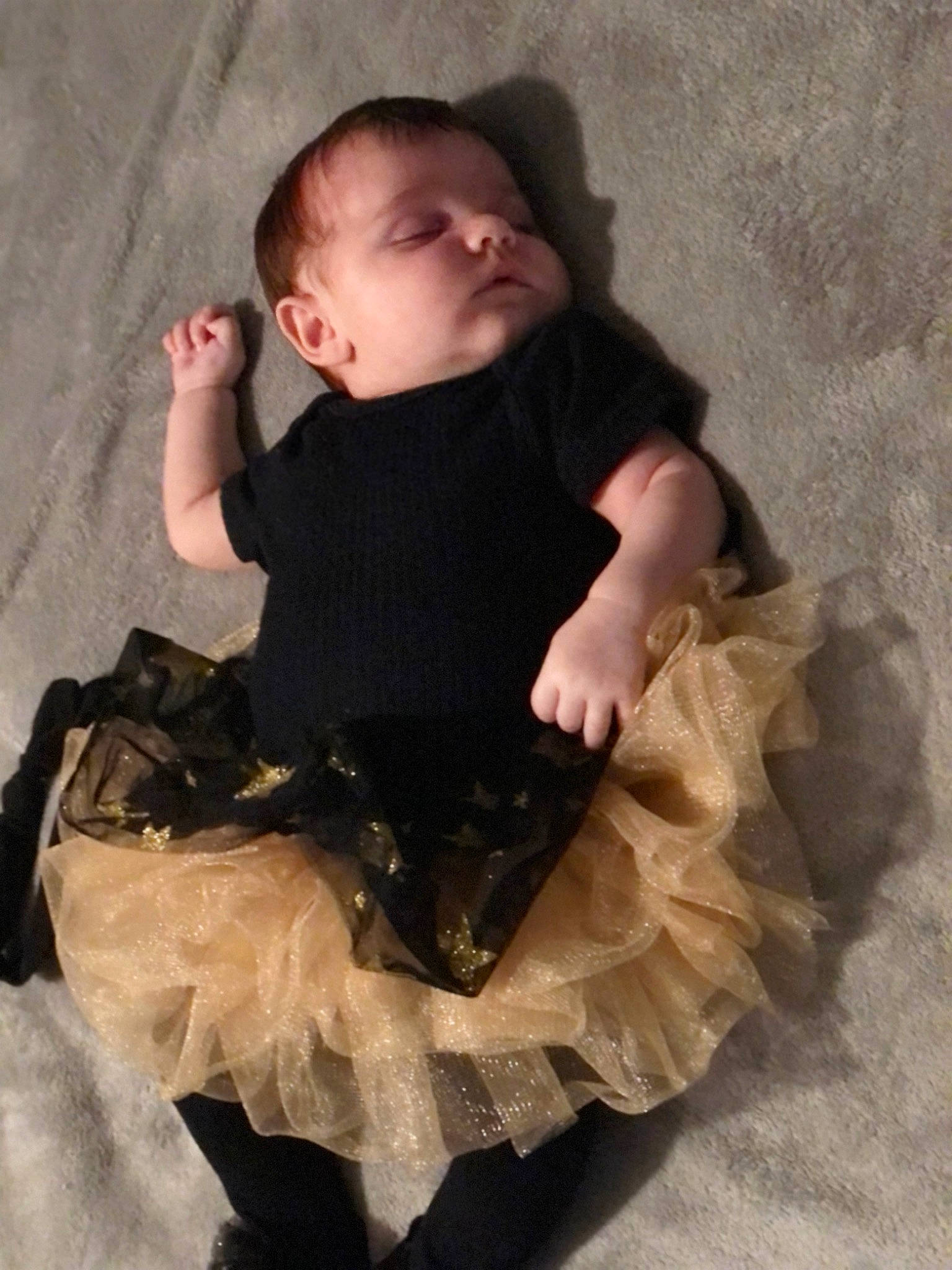 Ariah joined the competition — help win amazing prizes! baby, baby_products, baby_toddler_clothing, ballet_tutu, child, comfort, costume, day_dress, fashion_design, fur, hairstyle, hand, linens, outerwear, person, ruffle, sitting, sleeve, textile, toddler