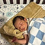 baby, sleeping, blanket, pillow, crib, infant, peaceful, resting, cozy, blue, white, checkered, tan, soft, cute, child, bed, nursery, indoors, peace