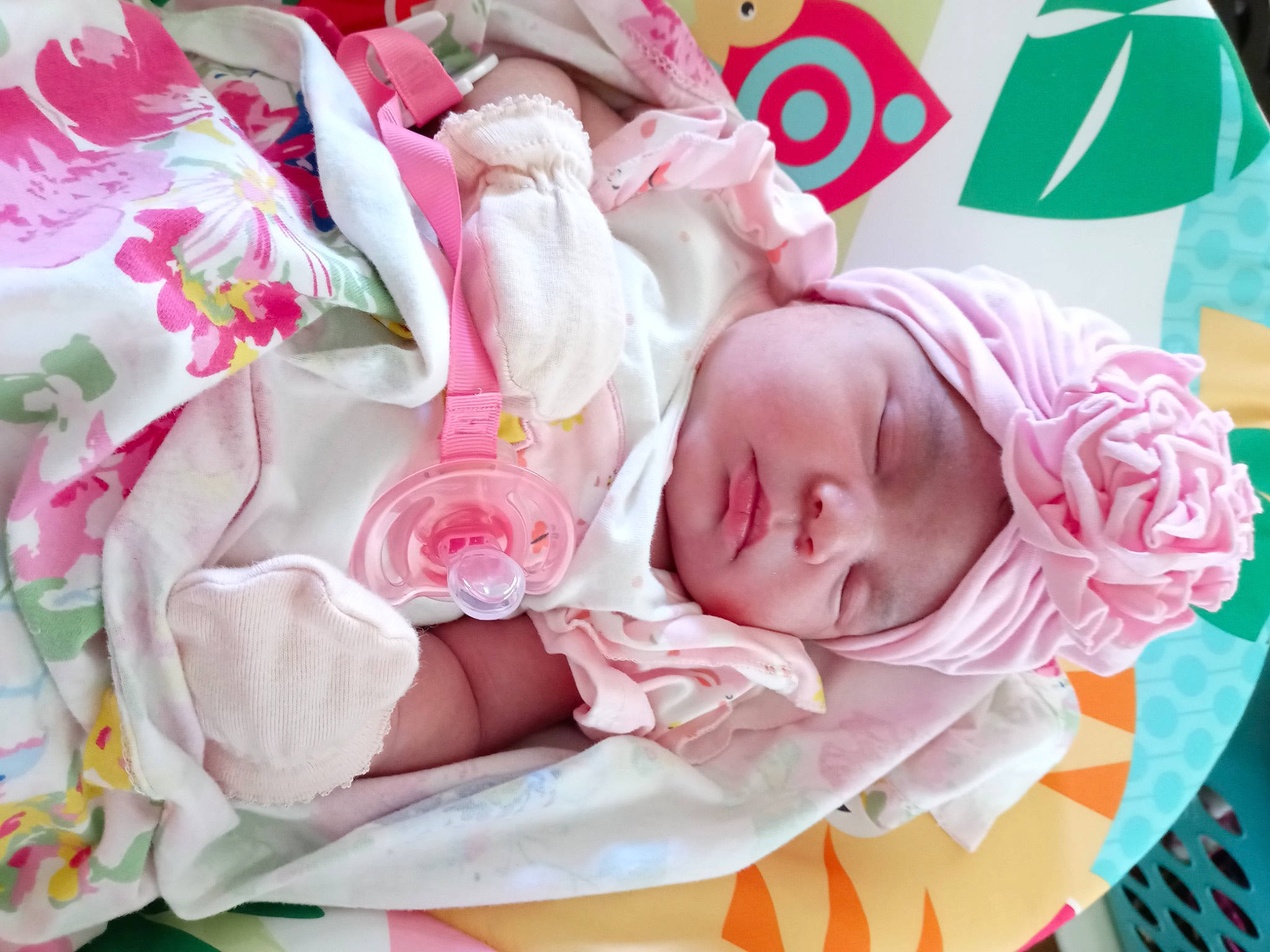 Emmarie is registered to the contest to win money with this photo: baby, baby_products, baby_sleeping, baby_toddler_clothing, bedtime, cheek, child, comfort, happy, headwear, linens, magenta, nap, peach, person, petal, pink, product, skin, sweetness