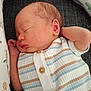 Noah joined the competition — help win amazing prizes! arm, baby, blanket, child, closeup, cozy, cute, face, head, indoors, infant, newborn, peaceful, portrait, rest, skin, sleeping, soft_texture, striped_clothing, wooden_buttons