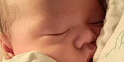 Noah is registered to the contest to win money with this photo: baby, blanket, calm, child, closeup, cute, face, head, indoors, infant, newborn, peaceful, portrait, resting, skin, sleeping, soft, tender, wrapped, young